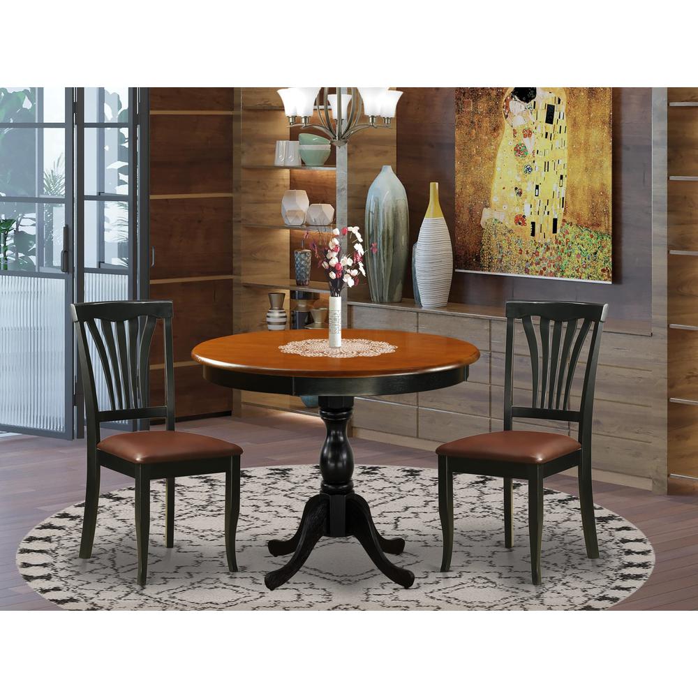 East West Furniture 3-Pc Kitchen Dining Table Set Includes a Wood Dining Table and 2 Faux Leather Dining Room Chairs with Slatted Back - Black Finish. Picture 2