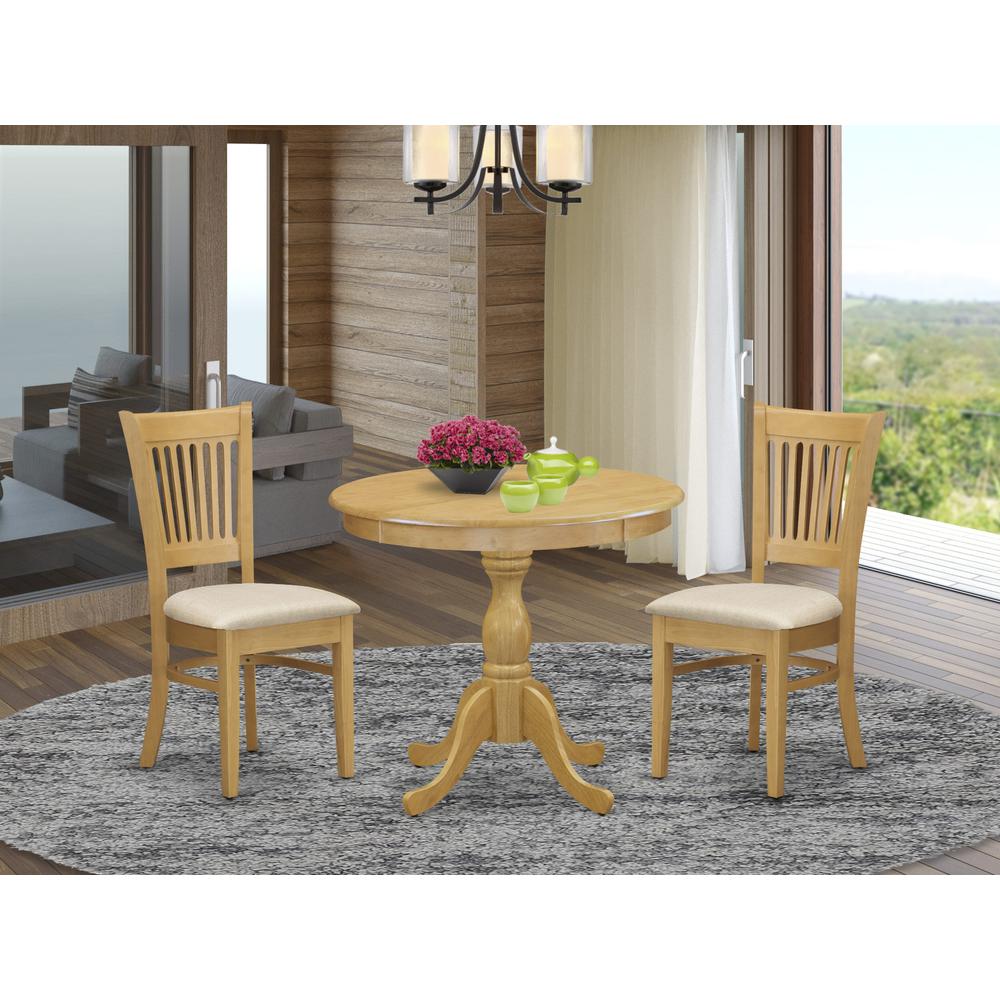 East West Furniture 3 Piece Dining Table Set Contains 1 Round Pedestal Table and 2 Oak Linen Fabric Wooden Kitchen Chairs with Slatted Back - Oak Finish. Picture 1
