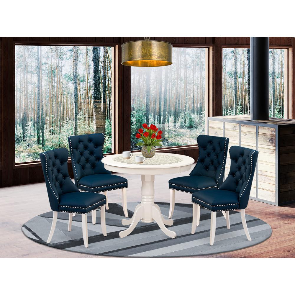 5 Piece Dining Room Set Consists of a Round Kitchen Table with Pedestal. Picture 1