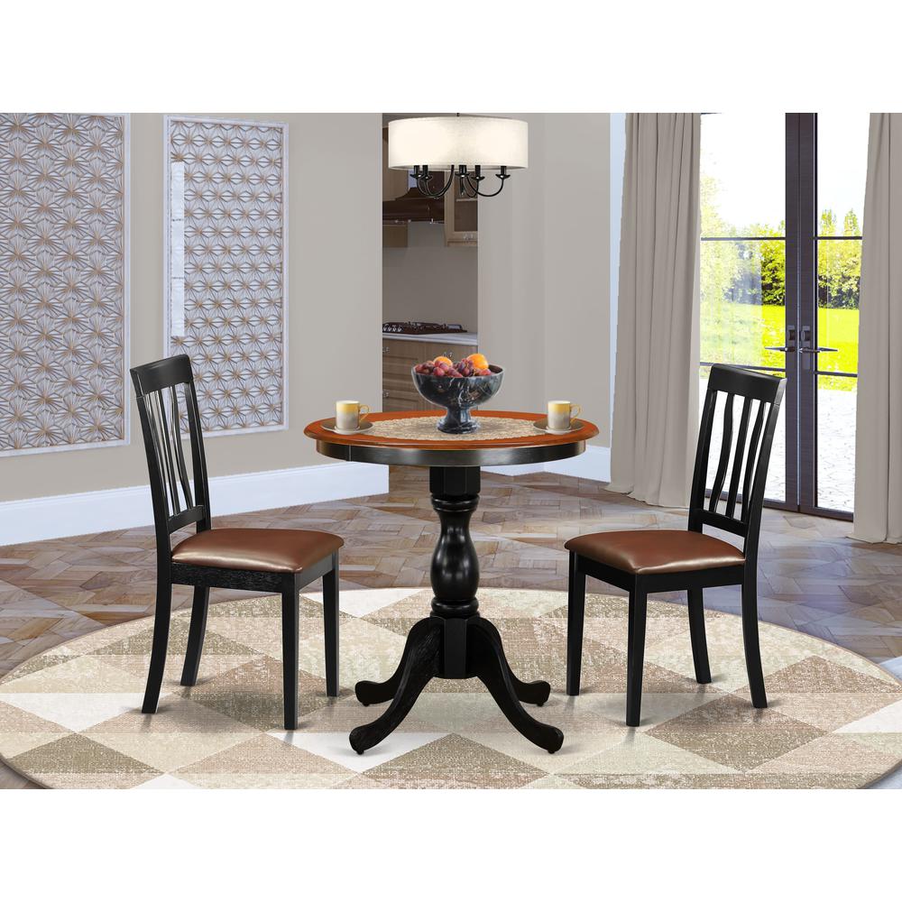 East West Furniture 3-Piece Dining Room Table Set Include a Dining Table and 2 Faux Leather Dining Chairs with Slatted Back - Black Finish. Picture 1