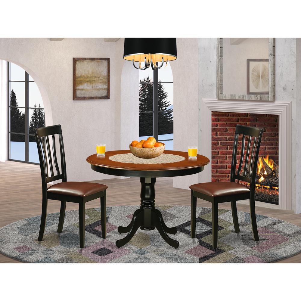3  Pc  set  with  a  Round  Dinette  Table  and  2  Leather  Kitchen  Chairs  in  Black. Picture 1