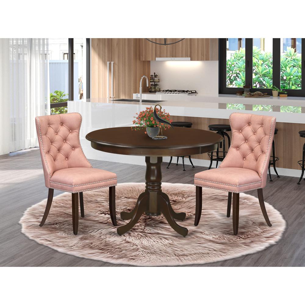 3 Piece Dining Set Consists of a Round Kitchen Table with Pedestal. Picture 1