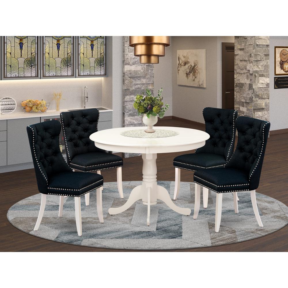 5 Piece Dining Room Table Set Consists of a Round Wooden Table with Pedestal. Picture 1