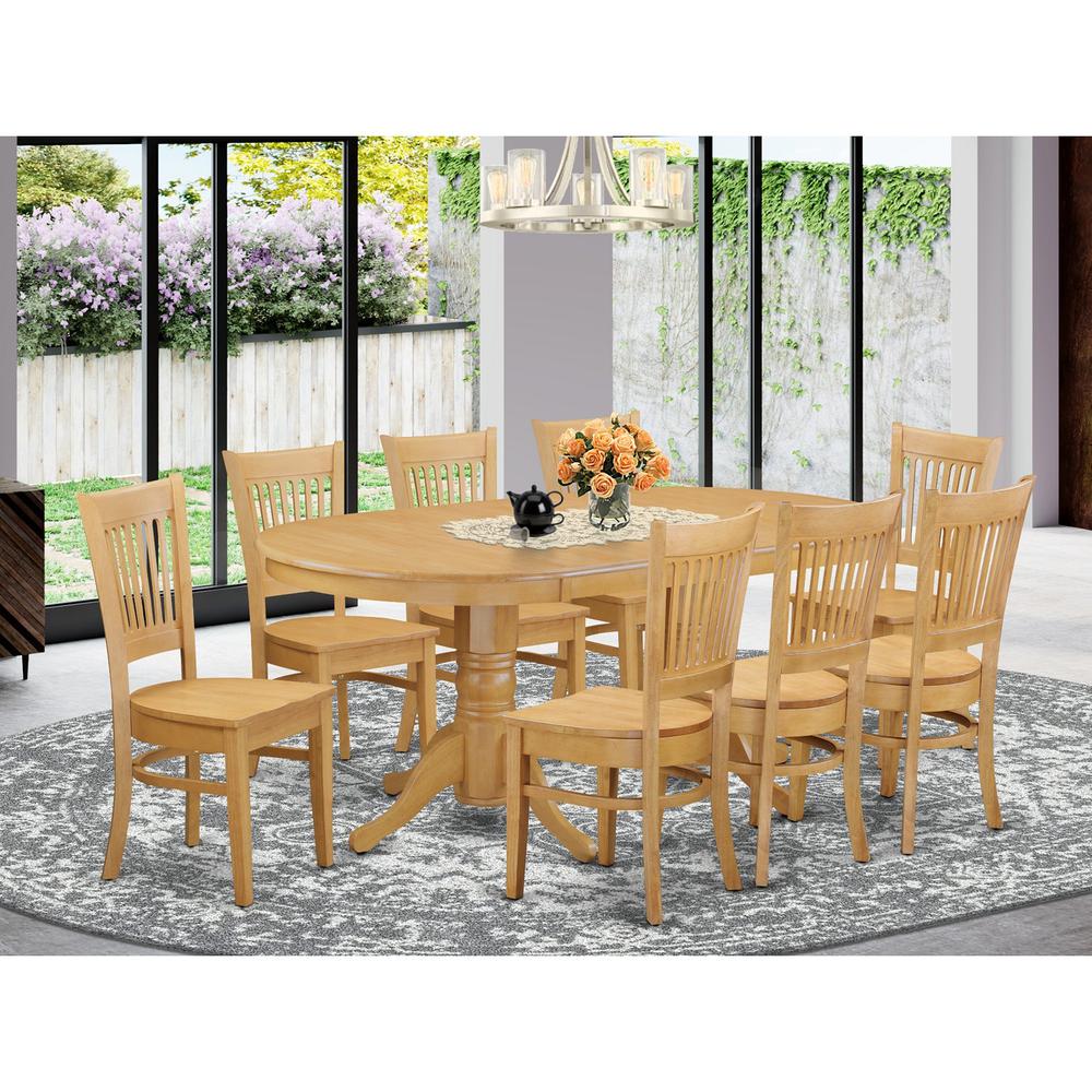 9  Pc  Dining  room  set-Double  Pedestal  Oval  and  Leaf  and  8  Dining  Chairs. The main picture.