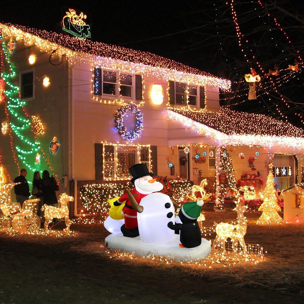 6Ft Santa Snowman and Penguin Inflatable with LED Lights. Picture 3