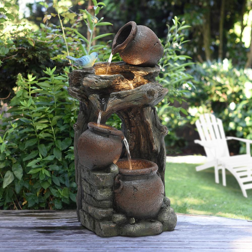 Rustic Pots and Pitchers on Tree Resin Outdoor Fountain with LED Lights. Picture 2