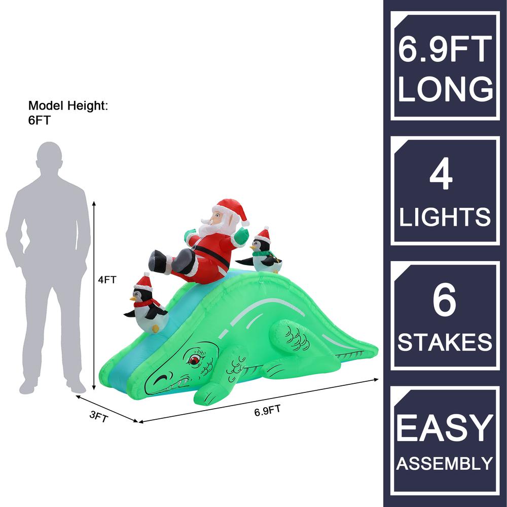 Santa and Penguins Trio Sliding on a Dinosaur Inflatable Holiday Decoration. Picture 10
