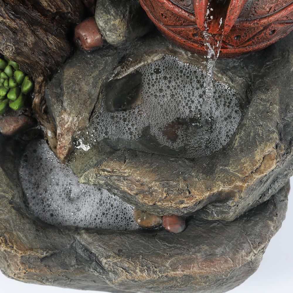 Resin Tree Stump and Rock Outdoor Fountain. Picture 4