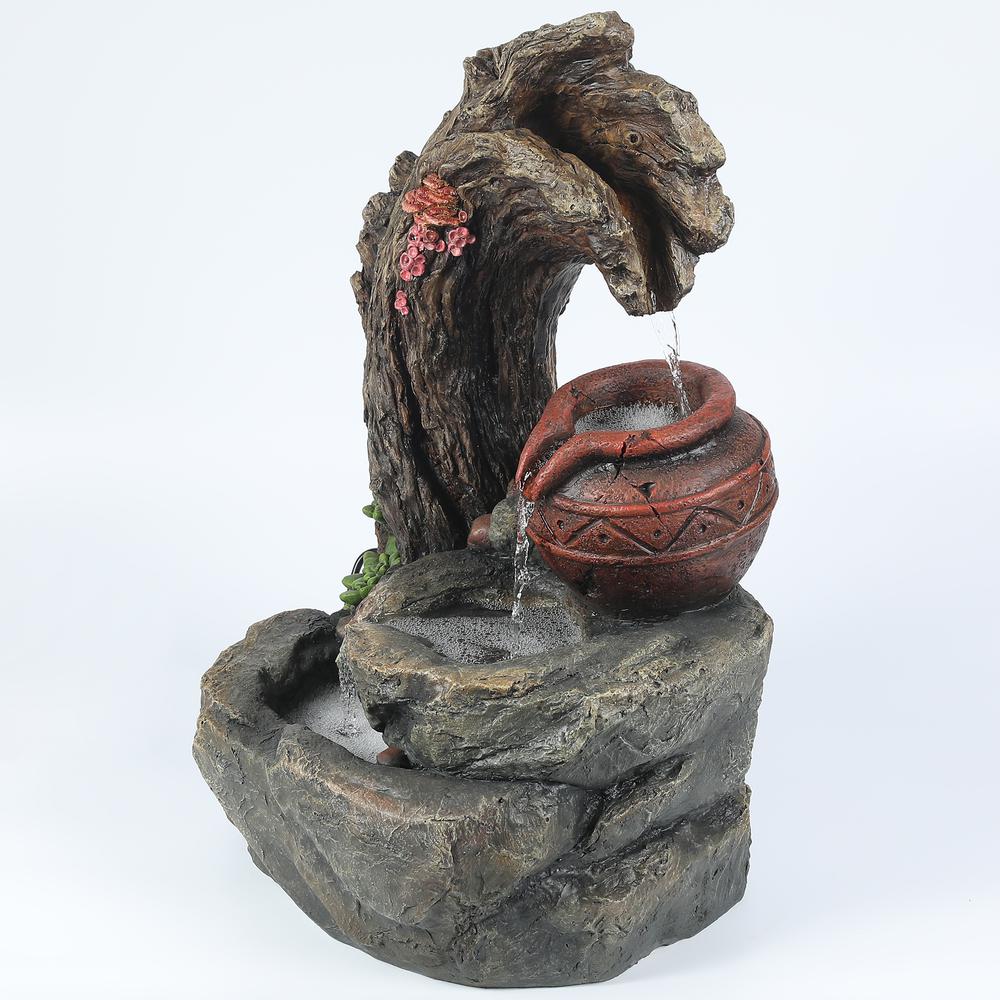 Resin Tree Stump and Rock Outdoor Fountain. Picture 6