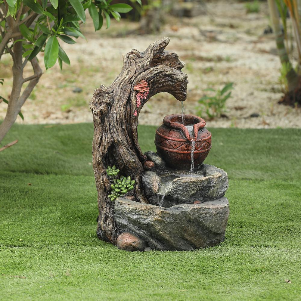 Resin Tree Stump and Rock Outdoor Fountain. Picture 8