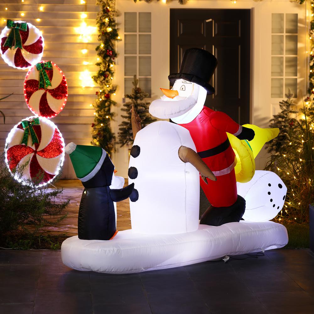 6Ft Santa Snowman and Penguin Inflatable with LED Lights. Picture 2