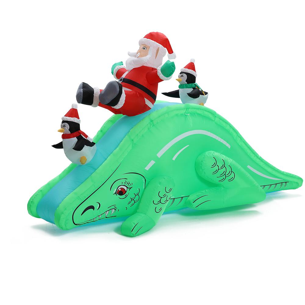 Santa and Penguins Trio Sliding on a Dinosaur Inflatable Holiday Decoration. Picture 1