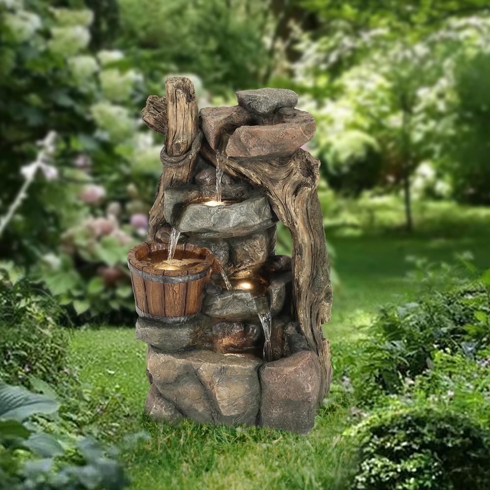 Resin Stacked Rock Wall and Barrel Outdoor Fountain with LED Lights. Picture 4