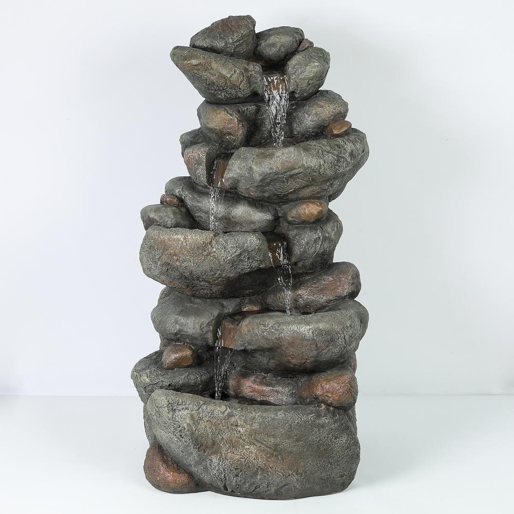 Resin 33.5in. H Cascading Rock Outdoor Fountain. Picture 1
