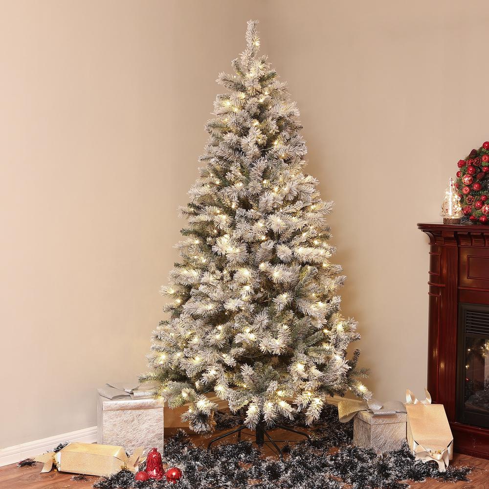 Pre-Lit Clear LED 7ft Artificial Flocked Christmas Tree with Metal Stand. Picture 2