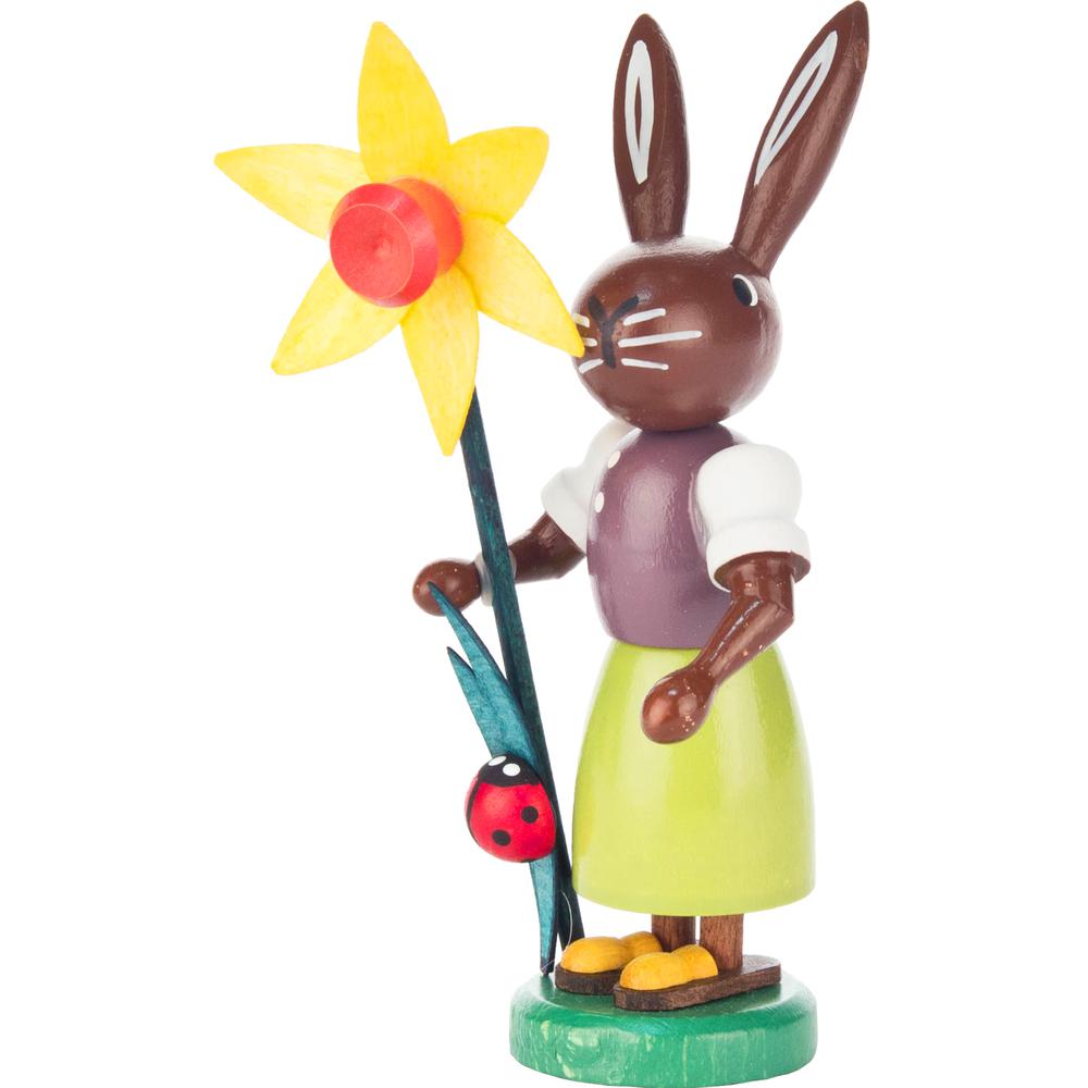 Dregeno Easter Figure - Rabbit Holding Flower - 4"H x 2"W x 1.5"D. The main picture.