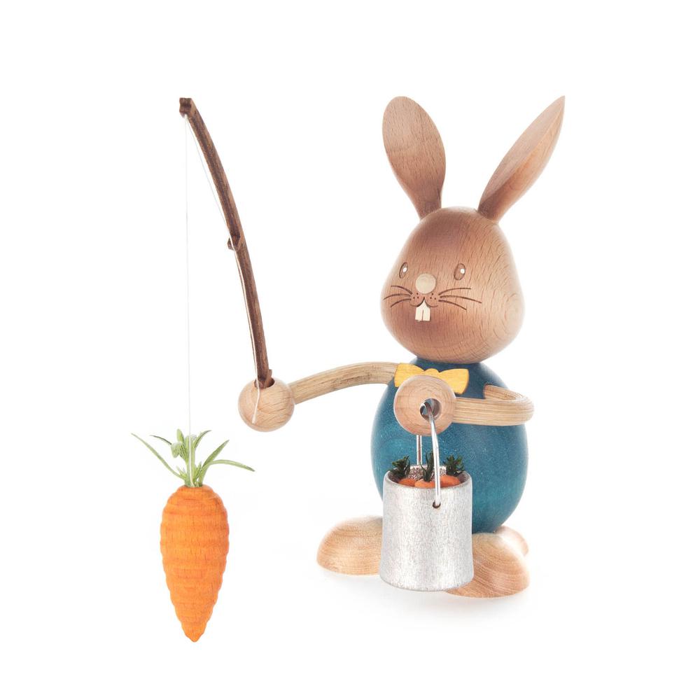 224-64815 - Dregeno Easter Figure - Bunny Fishing For Carrots - 6"H x 3.75"W x 3.25"D. The main picture.