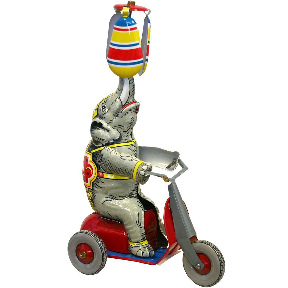 Collectible Tin Toy - Elephant on Scooter - 8.5"H x 3.5"W x 5.5"D. Picture 1