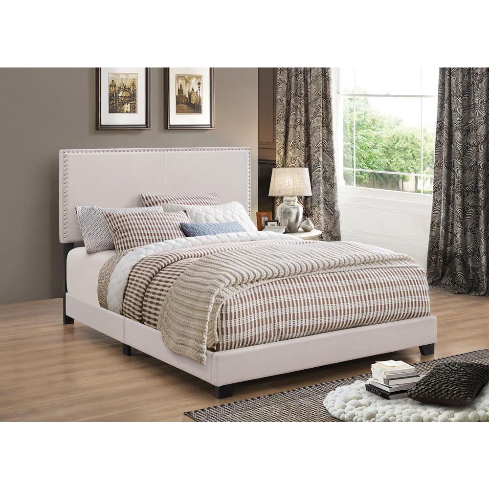 Boyd Full Upholstered Bed With Nailhead Trim Ivory. The main picture.