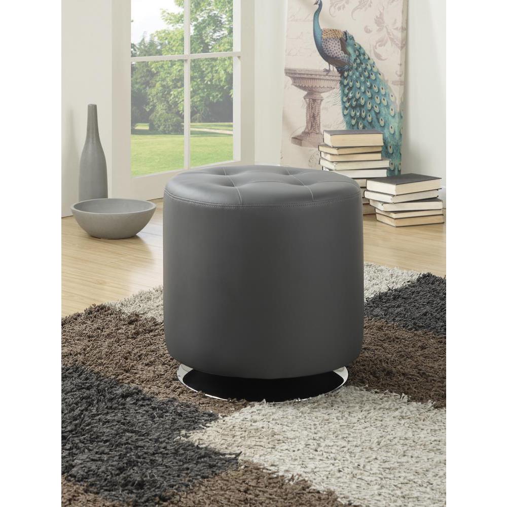 Bowman Round Upholstered Ottoman Grey. Picture 1