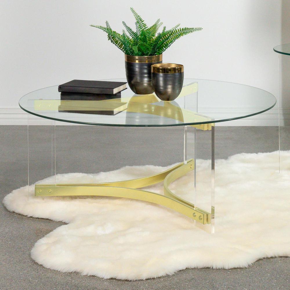 Janessa Round Glass Top Coffee Table With Acrylic Legs Clear and Matte Brass. Picture 10