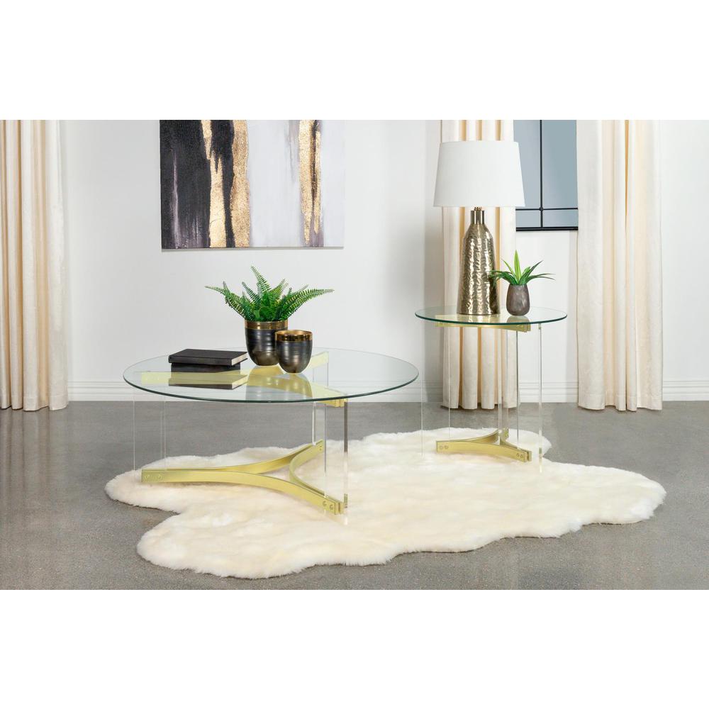 Janessa Round Glass Top Coffee Table With Acrylic Legs Clear and Matte Brass. Picture 9