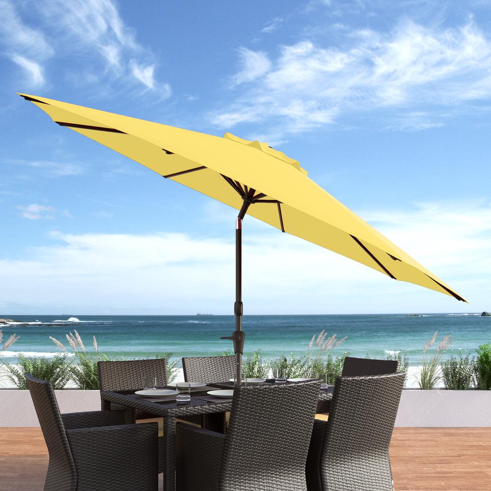 Wind Resistant Tilting Patio Umbrella in Yellow. Picture 3
