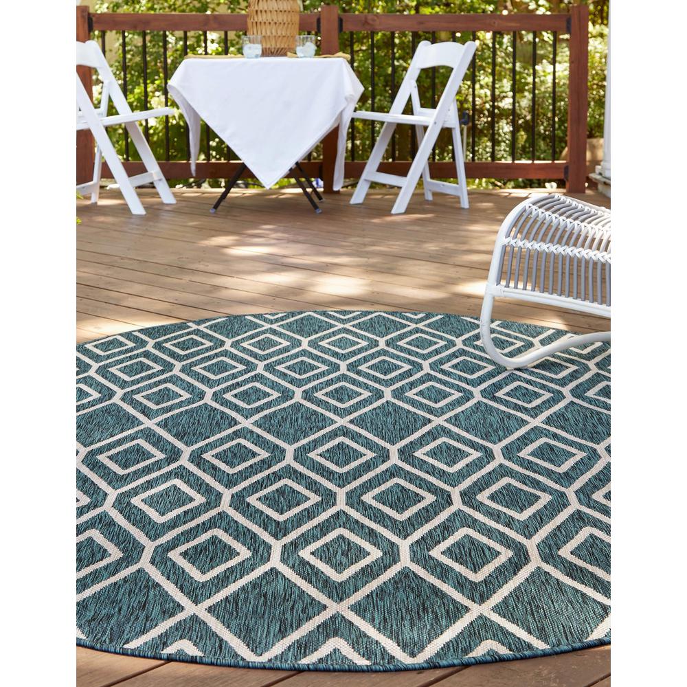 Jill Zarin Outdoor Turks and Caicos Area Rug 5' 5" x 8' 0", Oval Teal. Picture 3