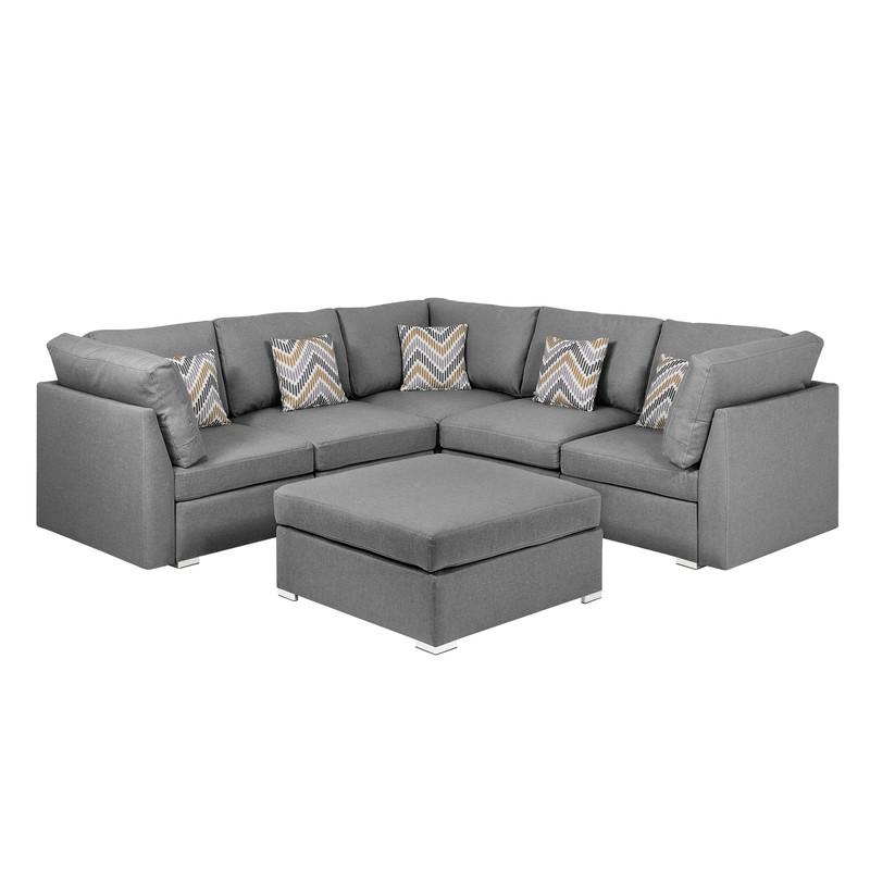 Amira Gray Fabric Reversible Sectional Sofa with Ottoman and Pillows. The main picture.