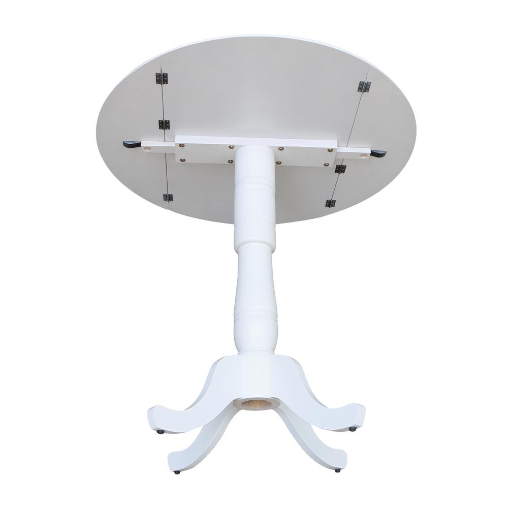 42 In Round dual drop Leaf Pedestal Table - 35.5 "H, White. Picture 11
