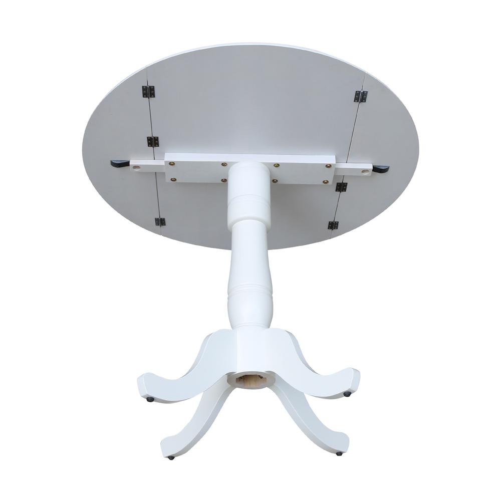 42 In Round dual drop Leaf Pedestal Table - 35.5 "H, White. Picture 4