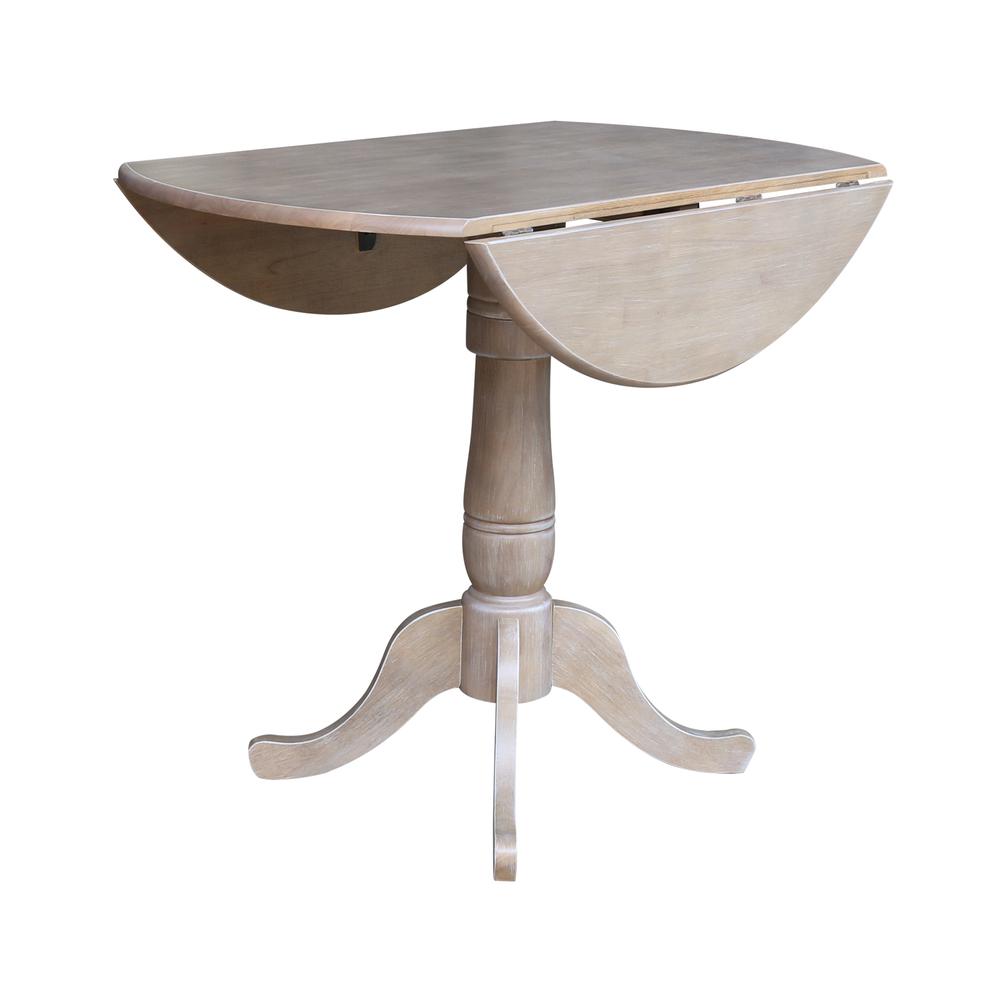 42" Round Dual Drop Leaf Pedestal Table - 35.5"H. Picture 4