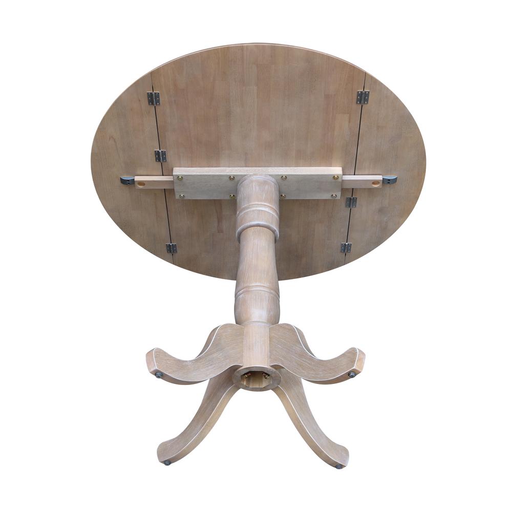 42" Round Dual Drop Leaf Pedestal Table - 35.5"H. Picture 7