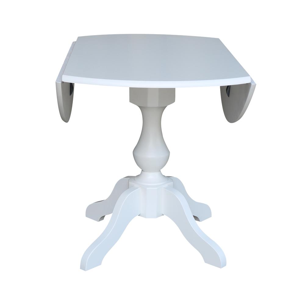 42 In Round dual drop Leaf Pedestal Table - 30.3"H, White. Picture 7