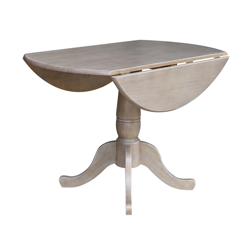 42" Round Dual Drop Leaf Pedestal Table - 29.5"H. Picture 4