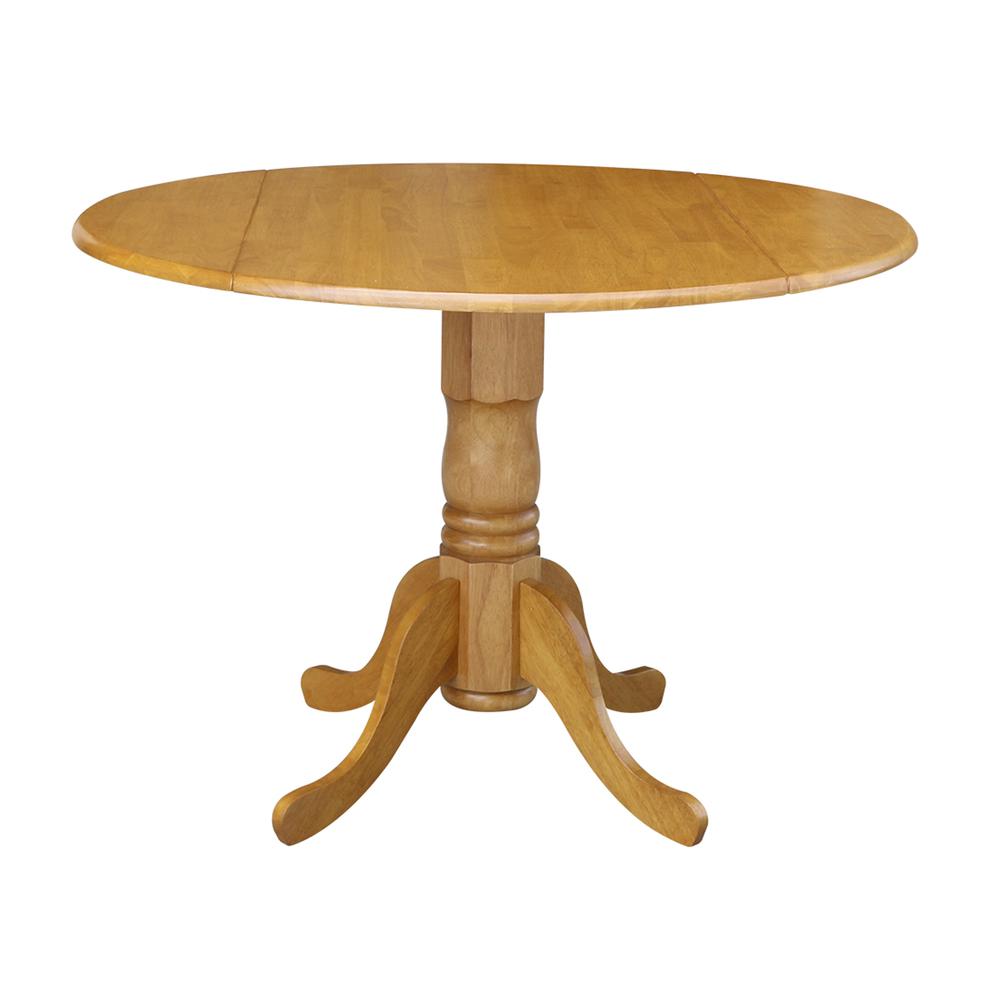42" Round Dual Drop Leaf Pedestal Table, Oak. Picture 9
