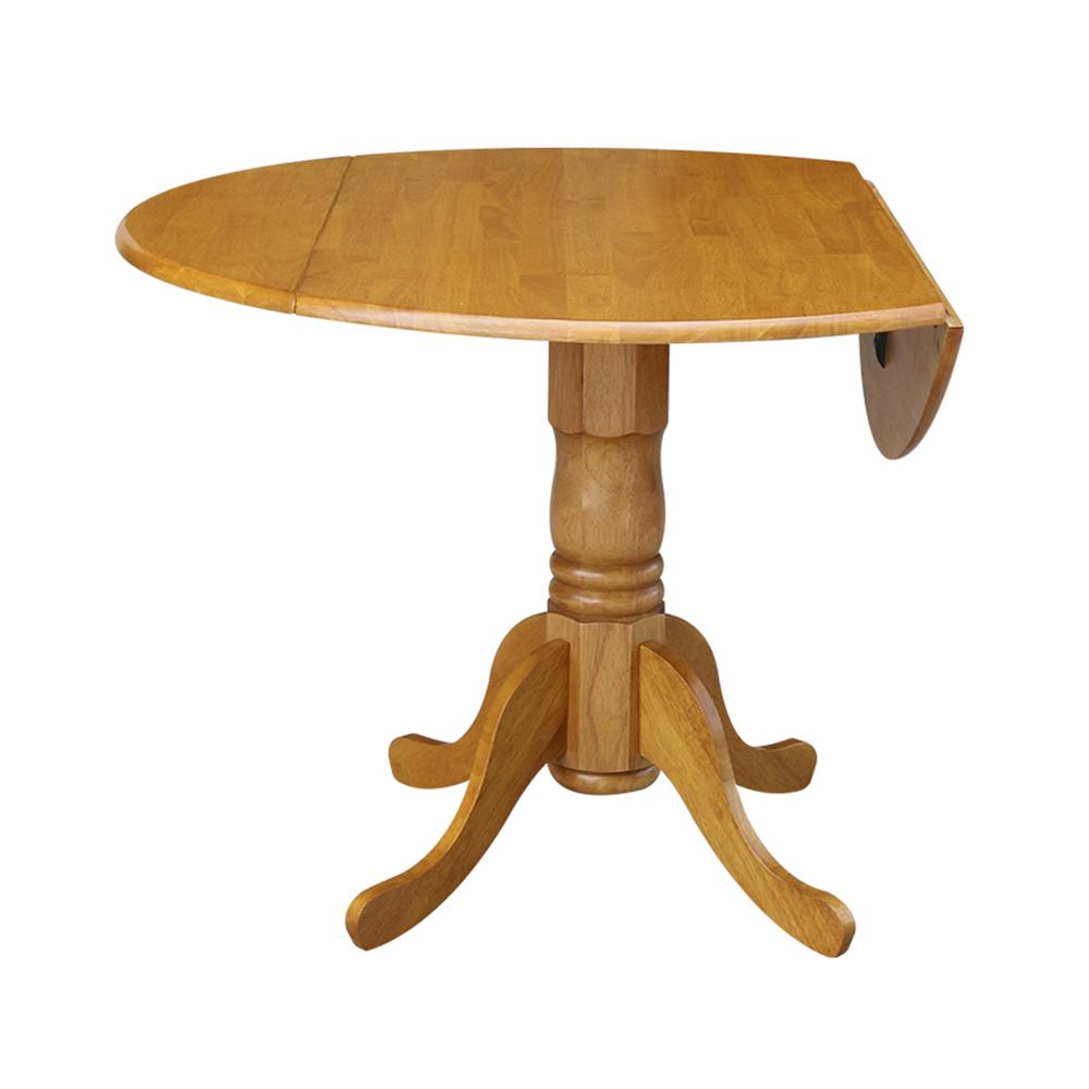 42" Round Dual Drop Leaf Pedestal Table, Oak. Picture 2
