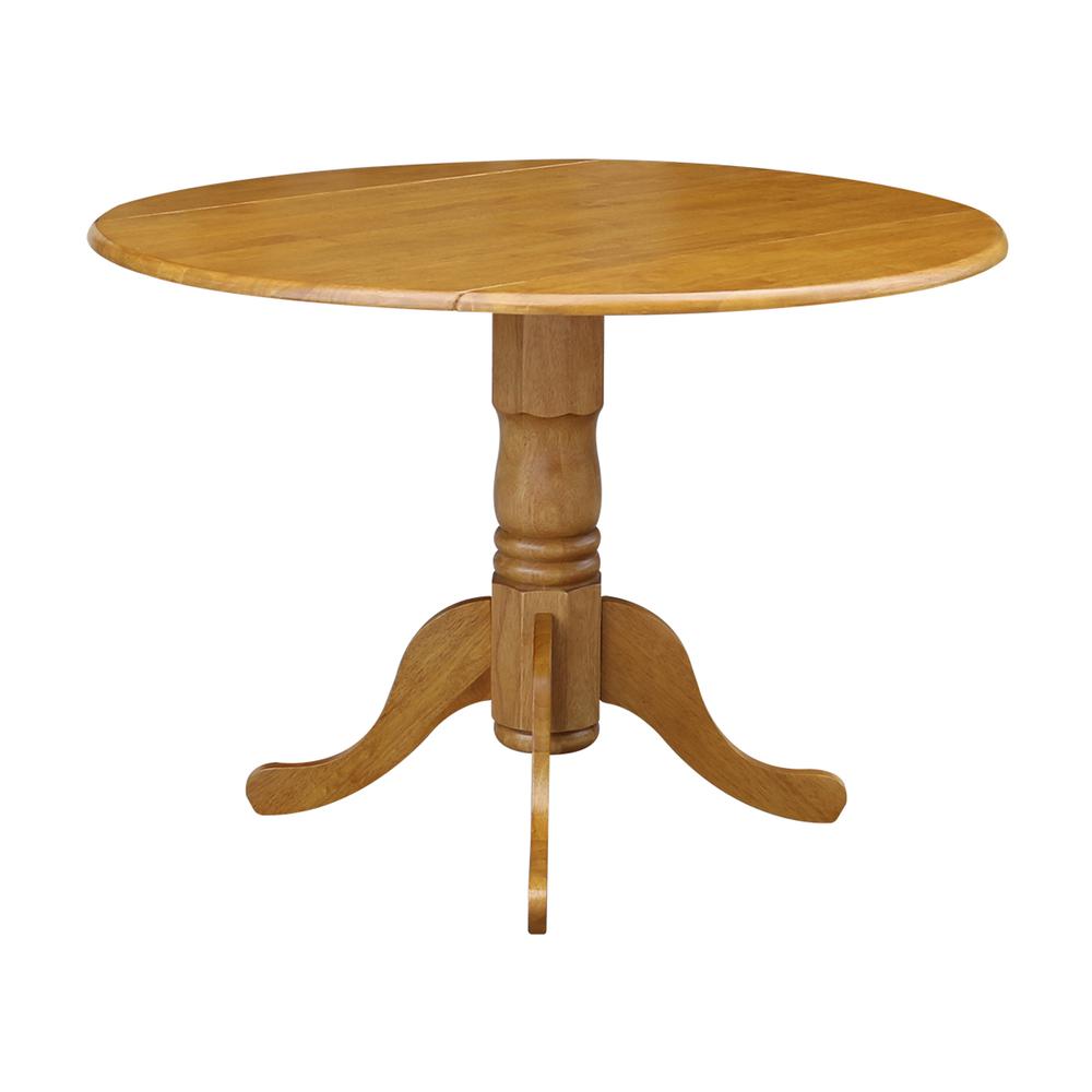 42" Round Dual Drop Leaf Pedestal Table, Oak. Picture 5