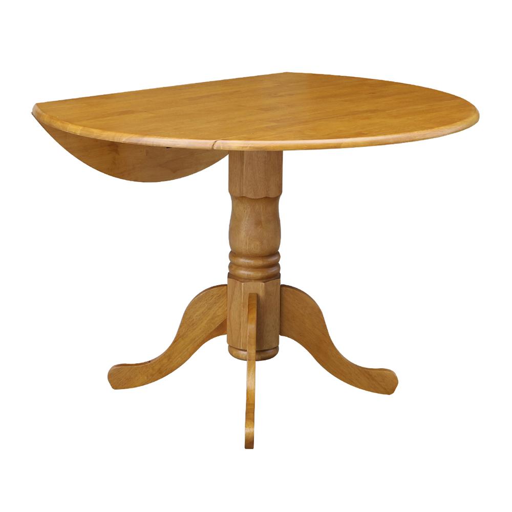 42" Round Dual Drop Leaf Pedestal Table, Oak. Picture 3