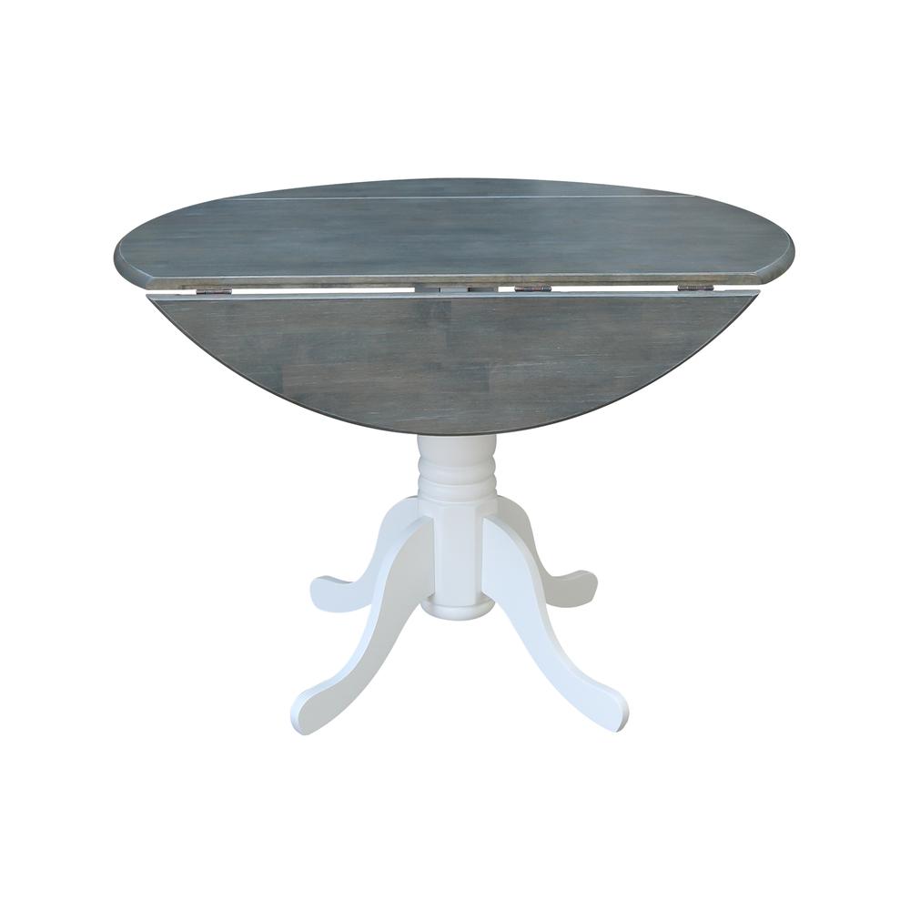 42" Round Dual Drop Leaf Pedestal Table. Picture 6