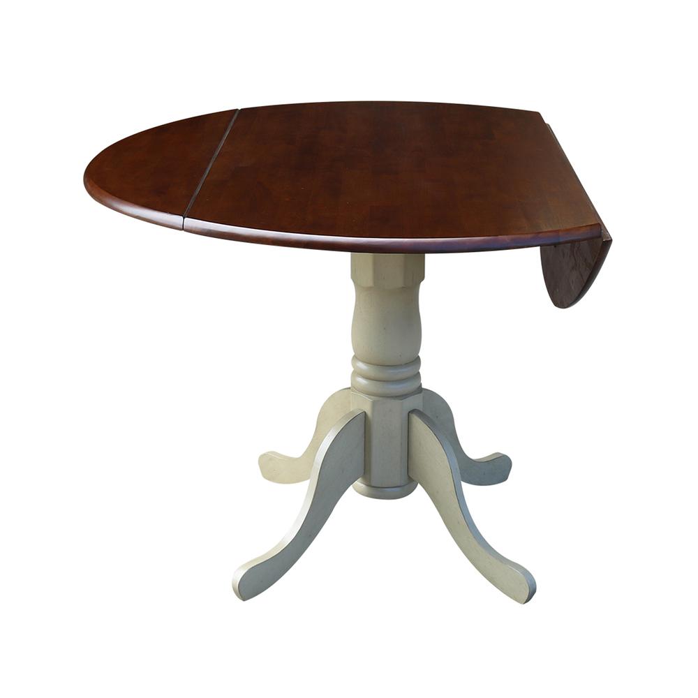 42" Round Dual Drop Leaf Pedestal Table, Antiqued Almond/Espresso. Picture 2