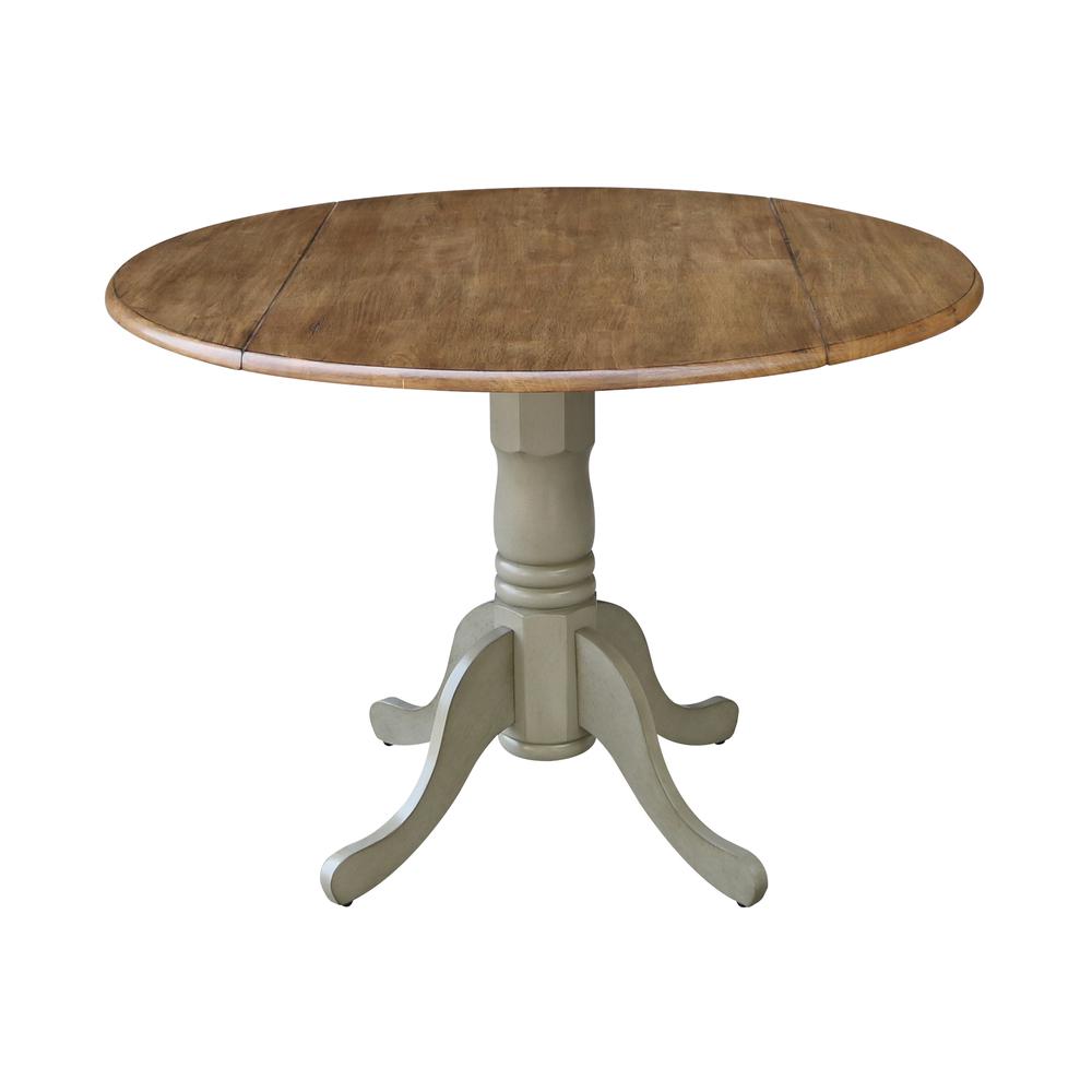 42" Round Dual Drop Leaf Pedestal Table. Picture 1