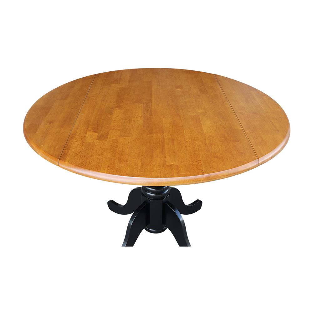 42" Round Dual Drop Leaf Pedestal Table, Black/Cherry. Picture 8