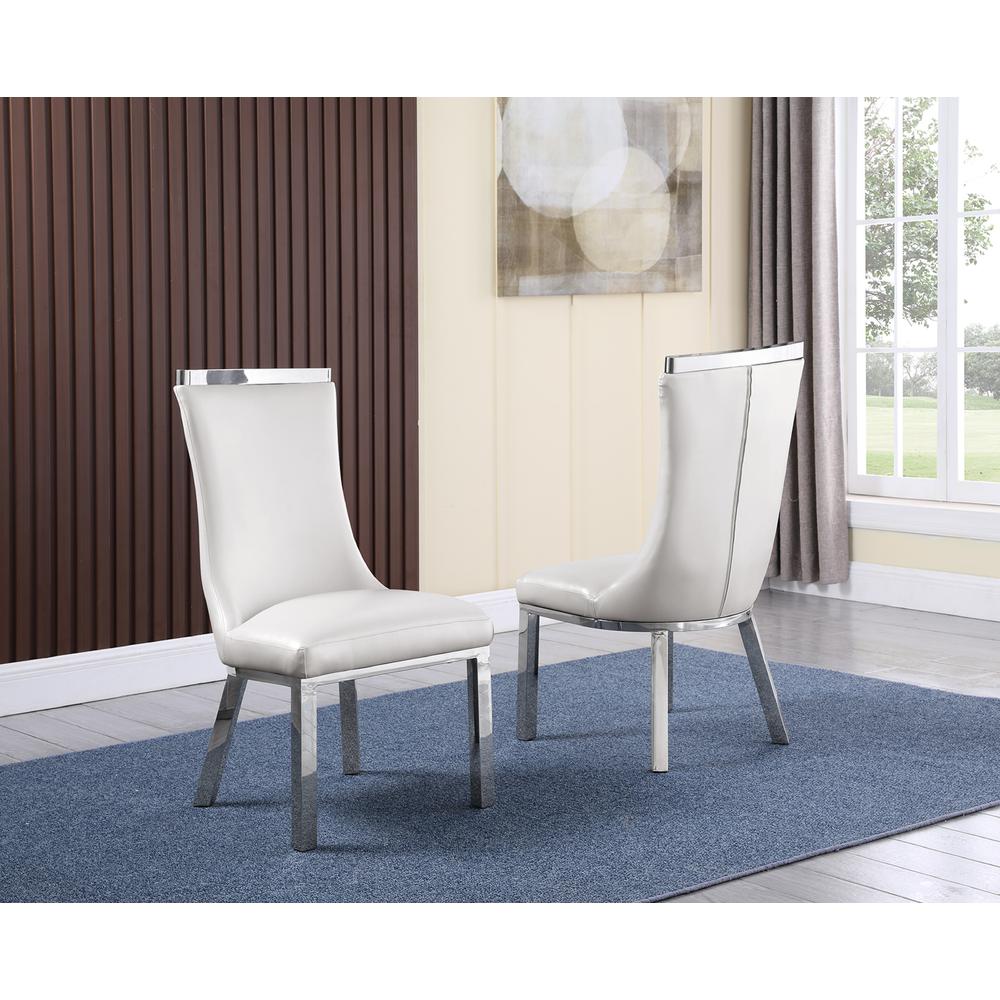 9pc dining set- Rectangle Marble table with a U shape silver base and 8 white faux leather chairs. Picture 3