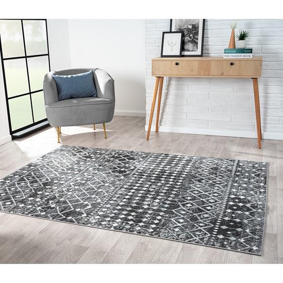75% Polypropylene 25% Polyester Moroccan Global Print Woven Area Rug - 4x6' Charcoal. Picture 1
