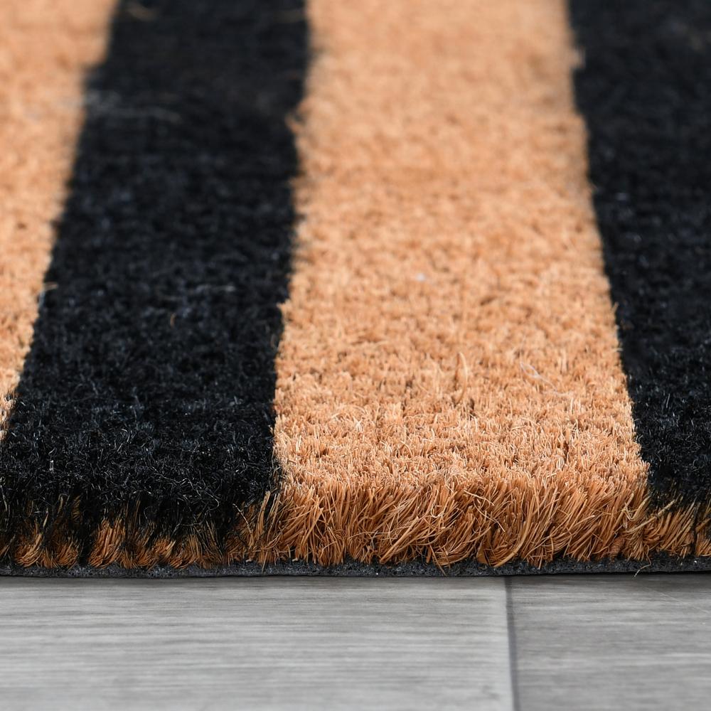 Striped Black and Natural 24x57 Doormat by Kosas Home. Picture 3