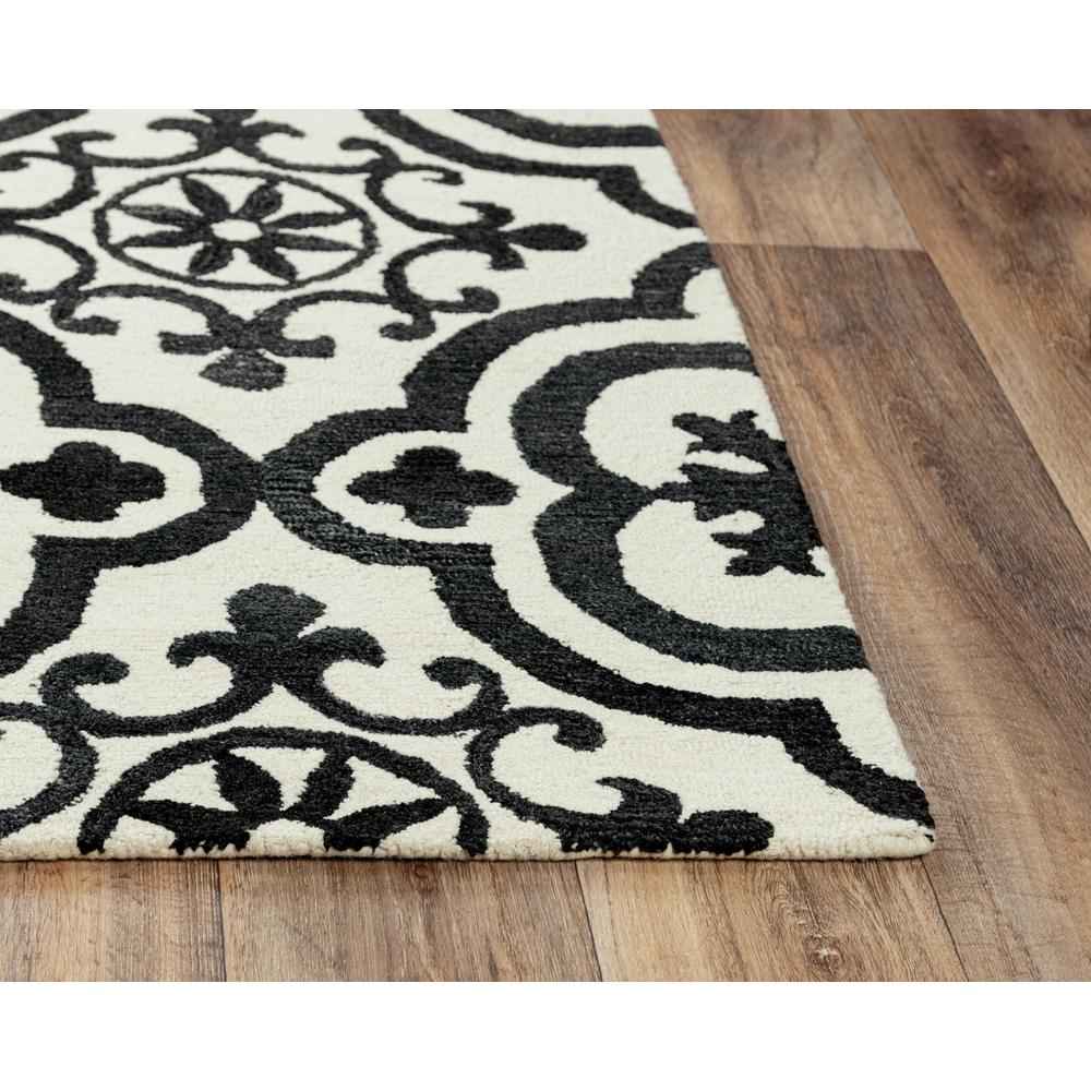 Hand Tufted Cut & Loop Pile Wool/ Recycled Polyester Rug, 7'6" x 9'6". Picture 1
