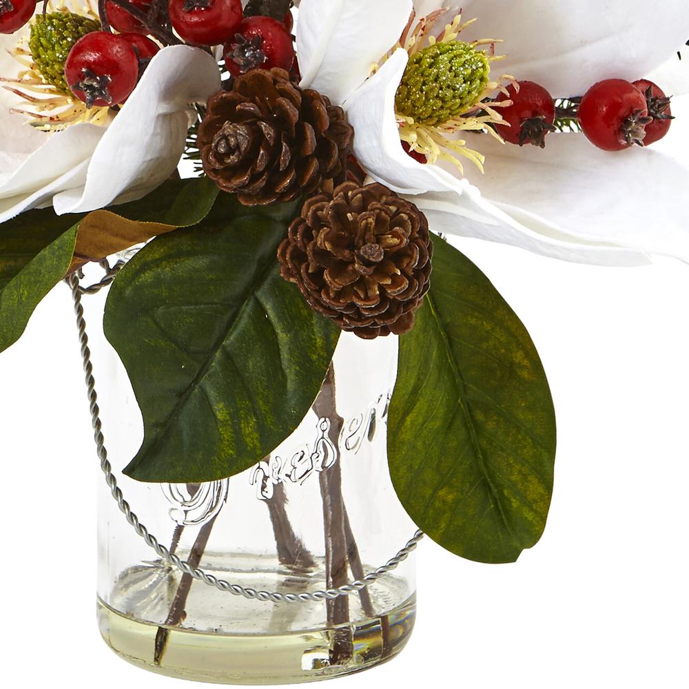 Magnolia, Pine, and Berry Holiday Arrangement in Glass Vase. Picture 2
