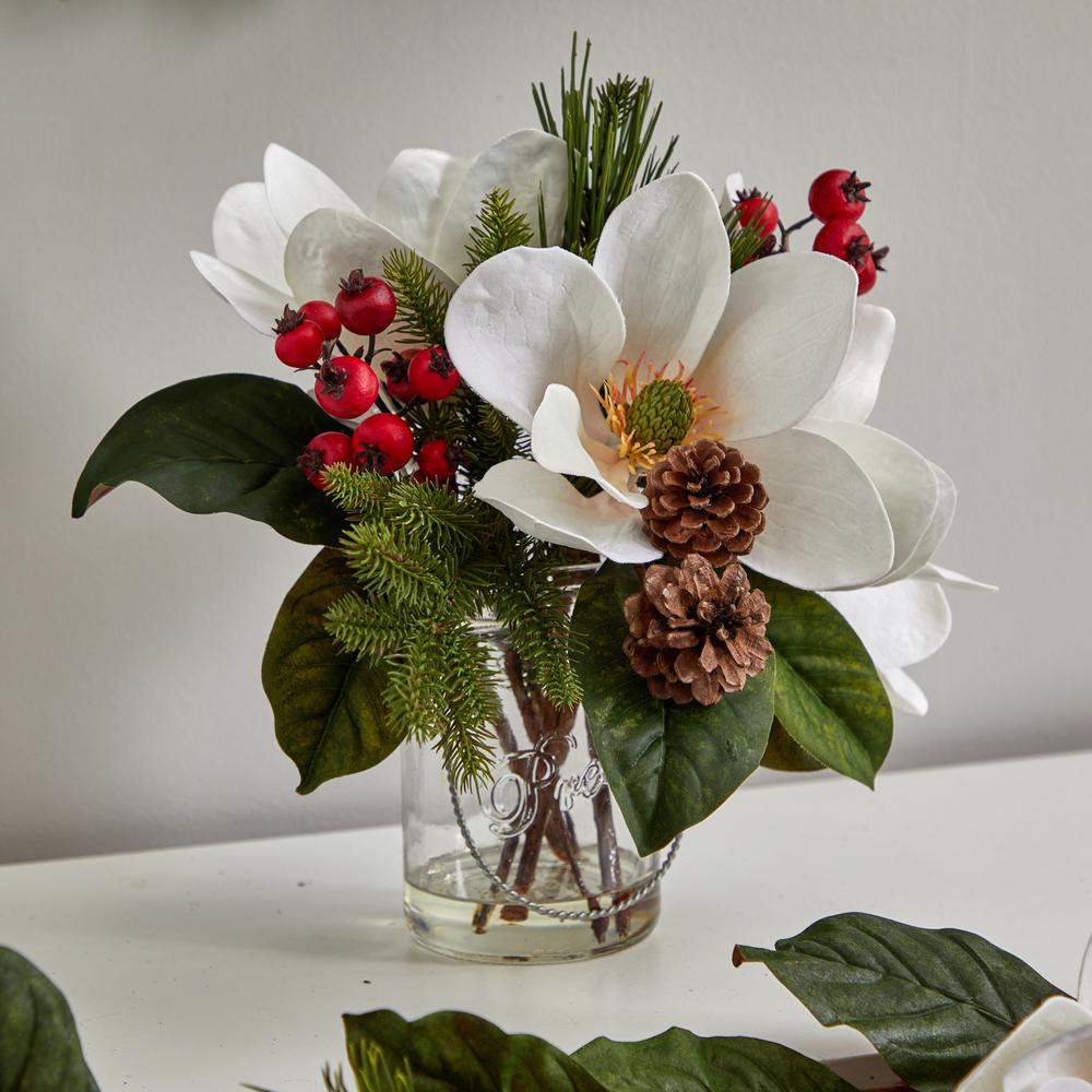 Magnolia, Pine, and Berry Holiday Arrangement in Glass Vase. Picture 6