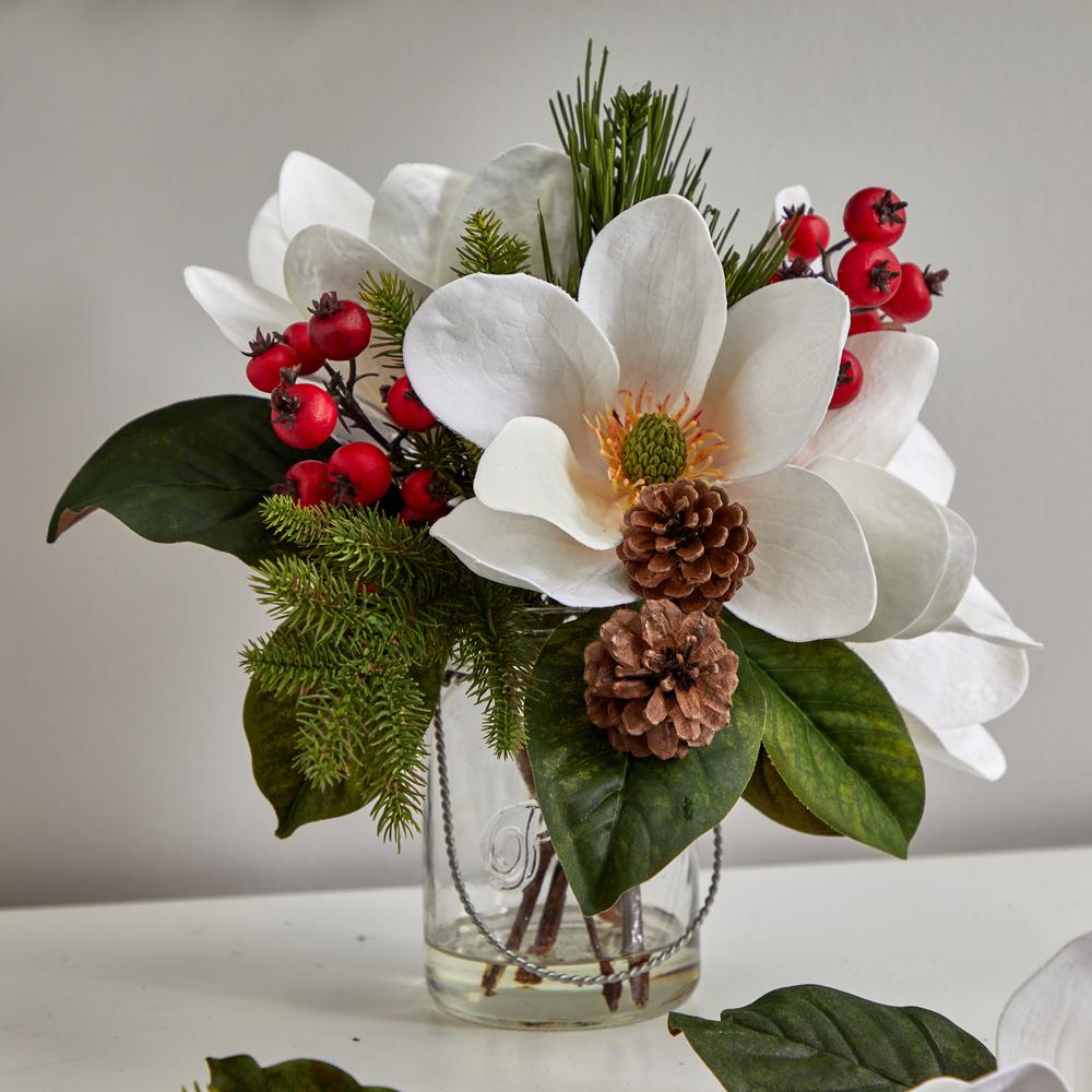 Magnolia, Pine, and Berry Holiday Arrangement in Glass Vase. Picture 7